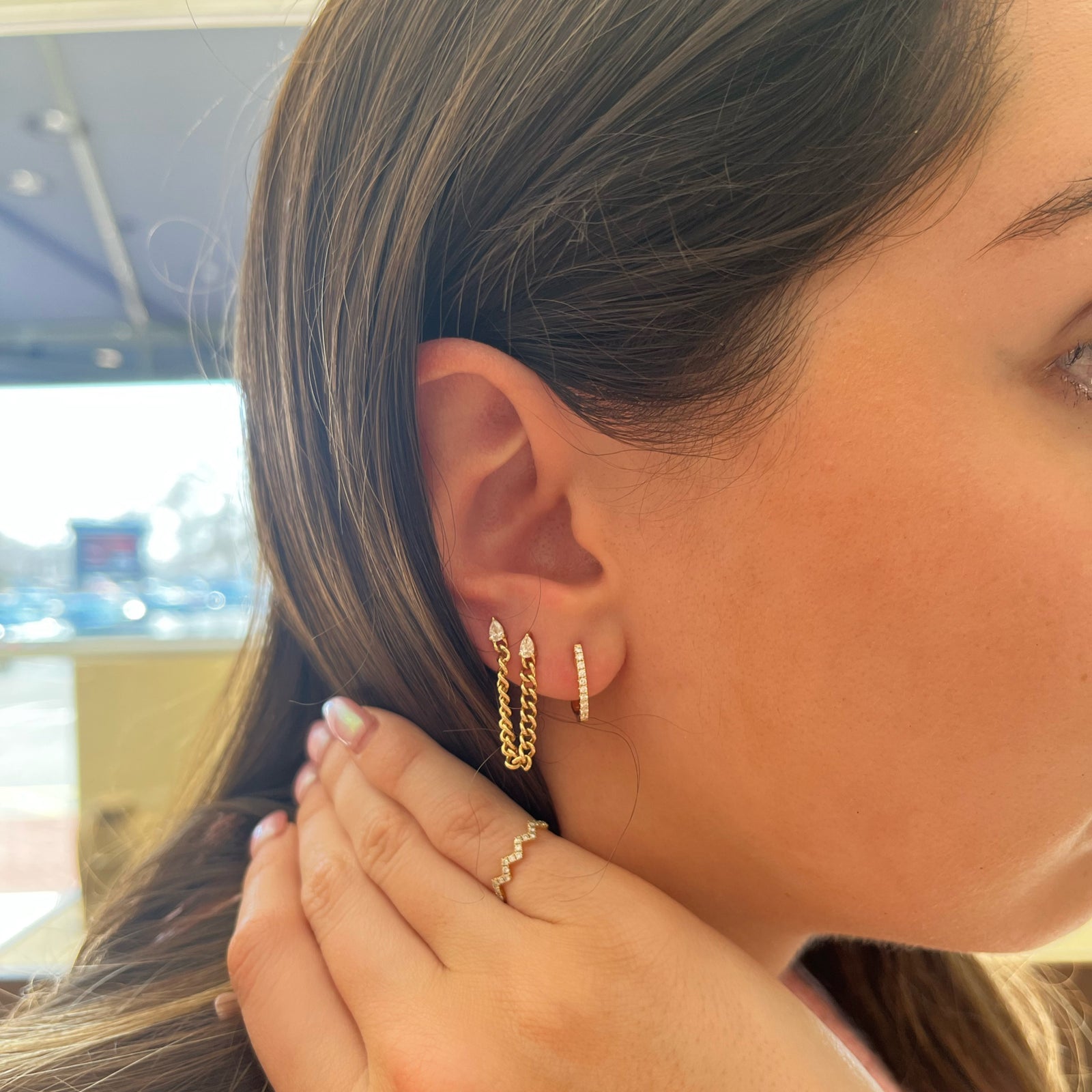 Mini diamond huggie earrings -14k gold weighing 1.87 grams  -20 round diamonds weighing .17 carats