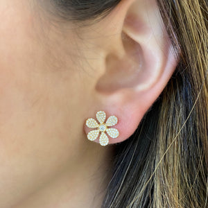 female model wearing Diamond large daisy stud earring - 14K gold weighing 2.92 grams.  - 206 round diamonds totaling 0.60 carats.