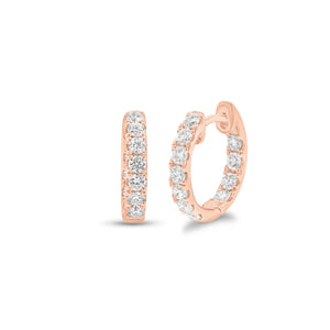 Solid 14K rose gold weighing 2.77 grams featuring 18 round diamonds weighing 0.39 carats 0.39 ct Huggie Earrings | Nuha Jewelers