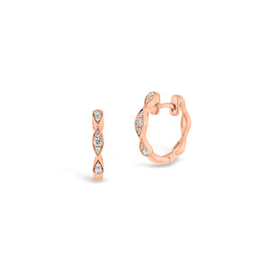 Small Diamond Wavy Huggie Earrings  -18K gold weighing 2.26 grams  -14 round diamonds totaling 0.15 carats
