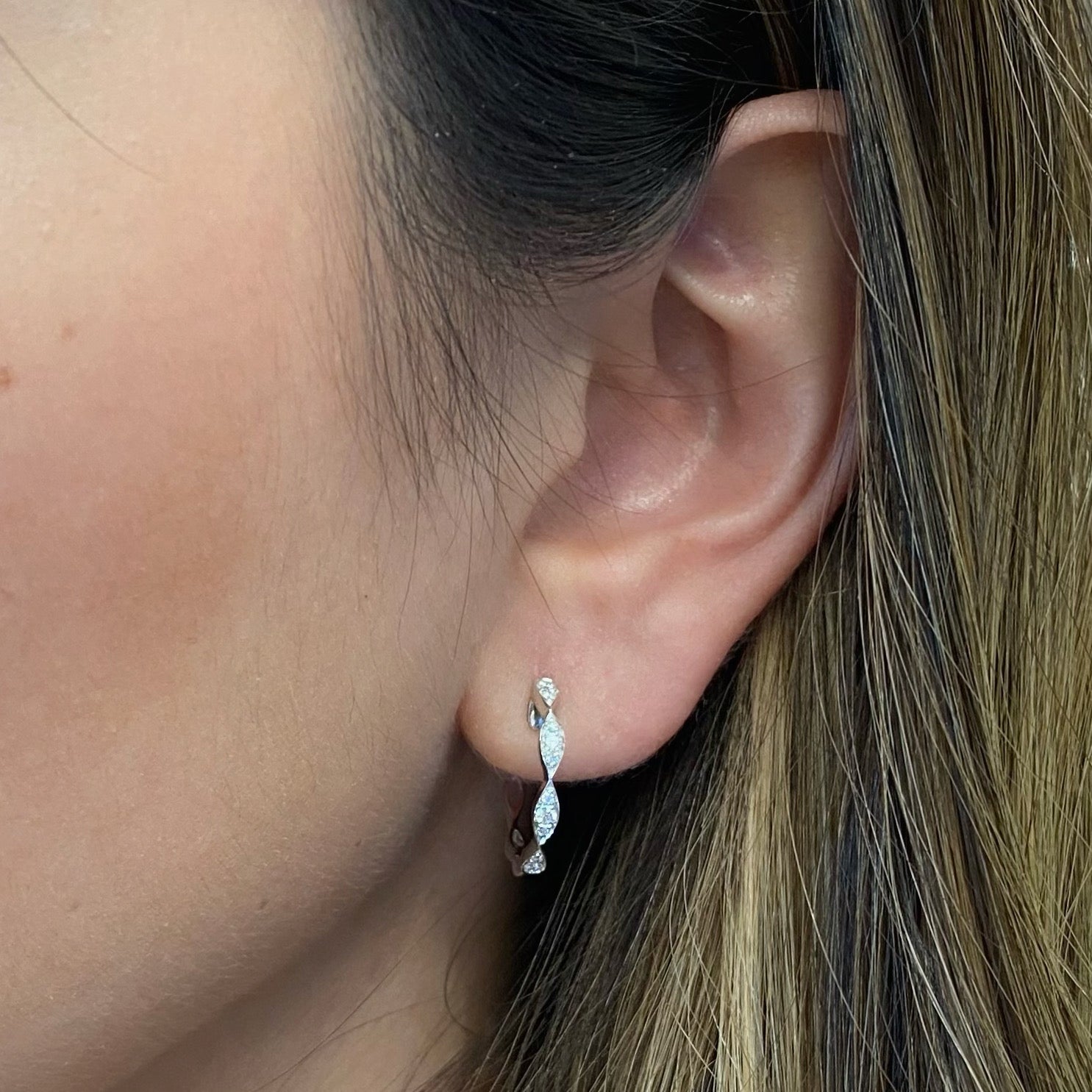 Large Diamond Wavy Hoop Earrings -18K gold weighing 2.72 grams  -20 round diamonds totaling 0.21 carats