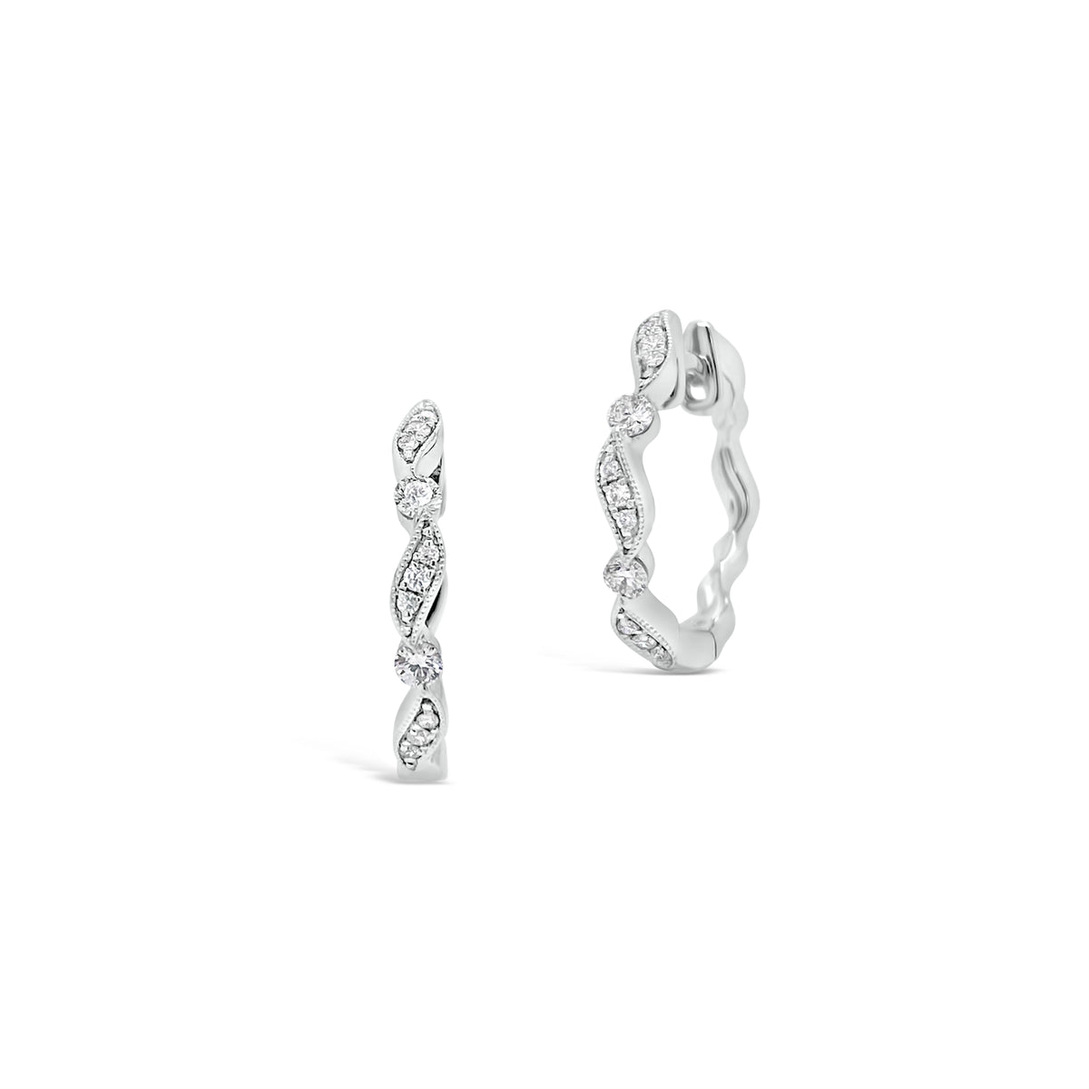Small Diamond Ribbon Huggie Earrings -18K gold weighing 2.27 grams  -22 round diamonds totaling 0.15 carats