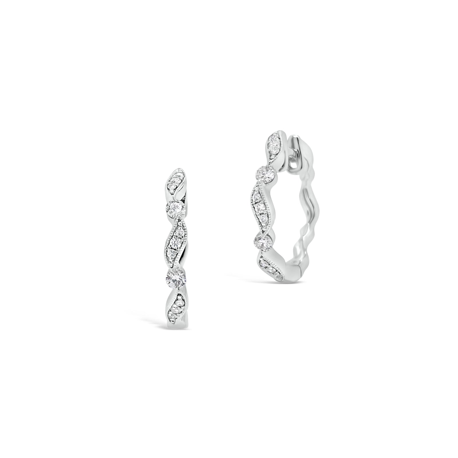 Small Diamond Ribbon Huggie Earrings -18K gold weighing 2.27 grams  -22 round diamonds totaling 0.15 carats