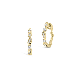 Small Diamond Ribbon Huggie Earrings -18K gold weighing 2.27 grams  -22 round diamonds totaling 0.15 carats