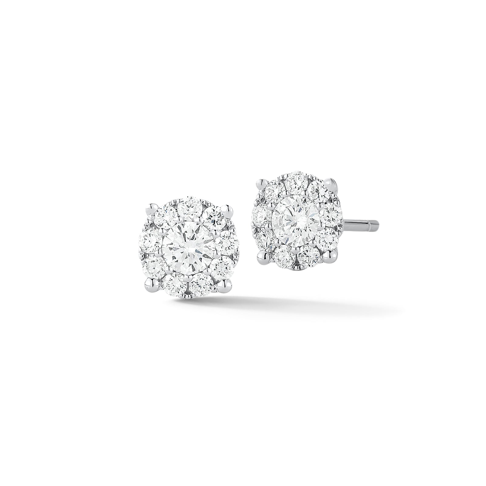 0.56ct round diamond cluster earrings- 18k gold weighing 1.29 grams  - 18 round shared prong-set diamonds totaling .28 carats.  - 2 round shared prong-set diamonds totaling .28 carats.