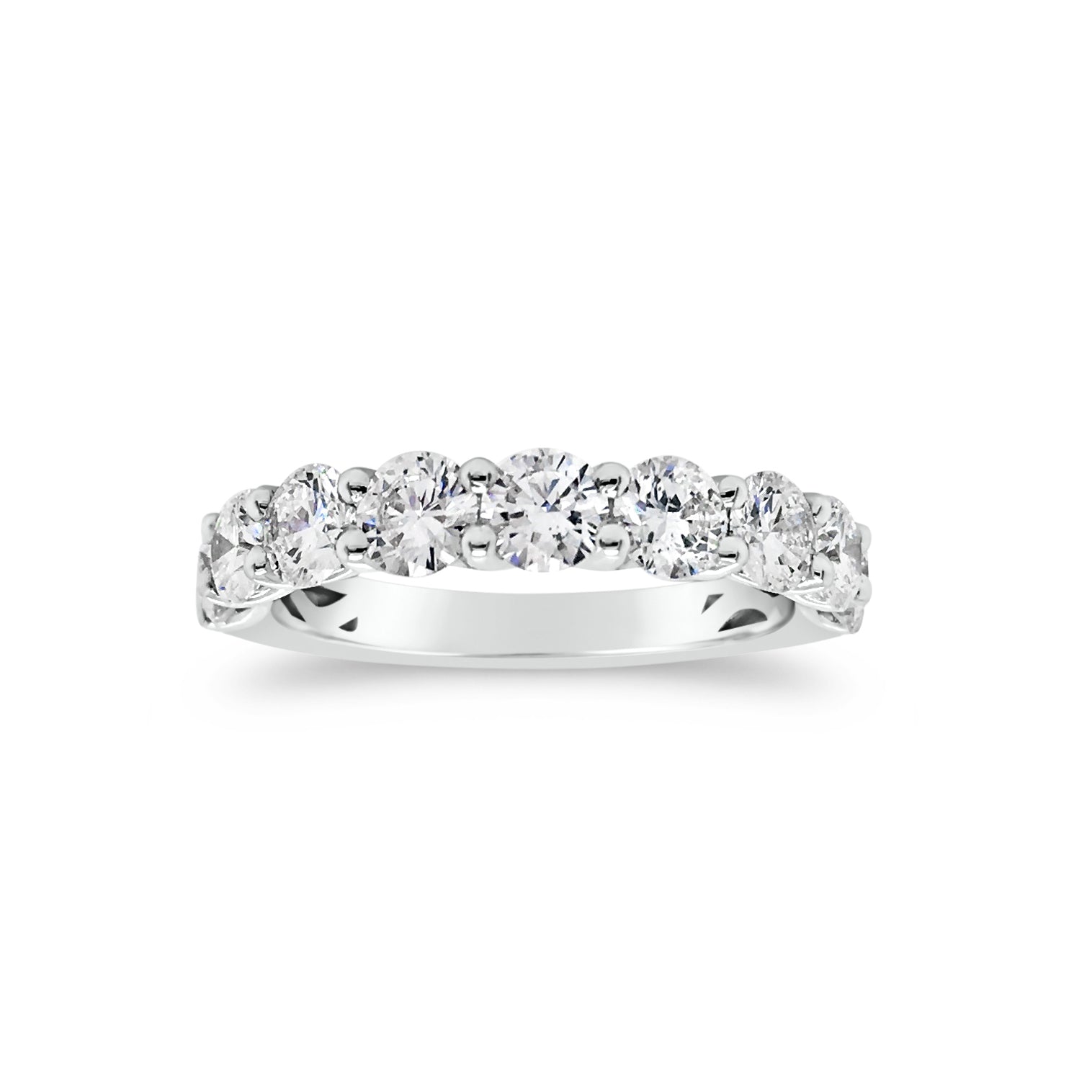 Shared Prong-Set Diamond Wedding Band  -18k gold weighing 3.29 grams  -9 round shared prong-set diamonds 1.68 carats