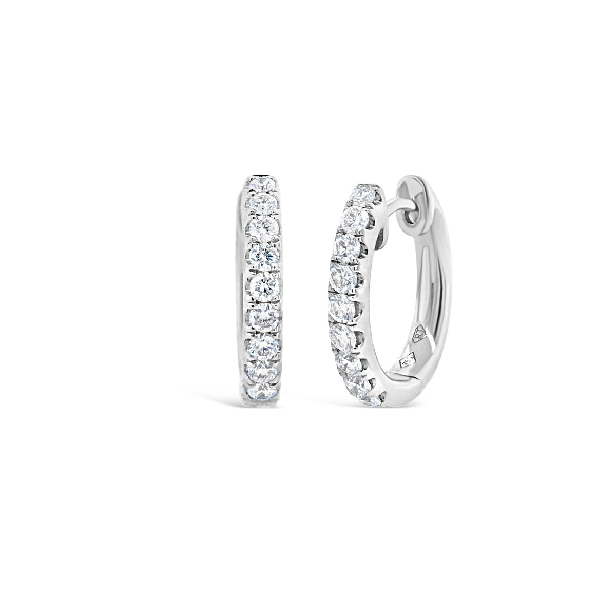 Small diamond huggie earrings -18k gold weighing 3.76 grams  -18 round diamonds weighing .38 carats