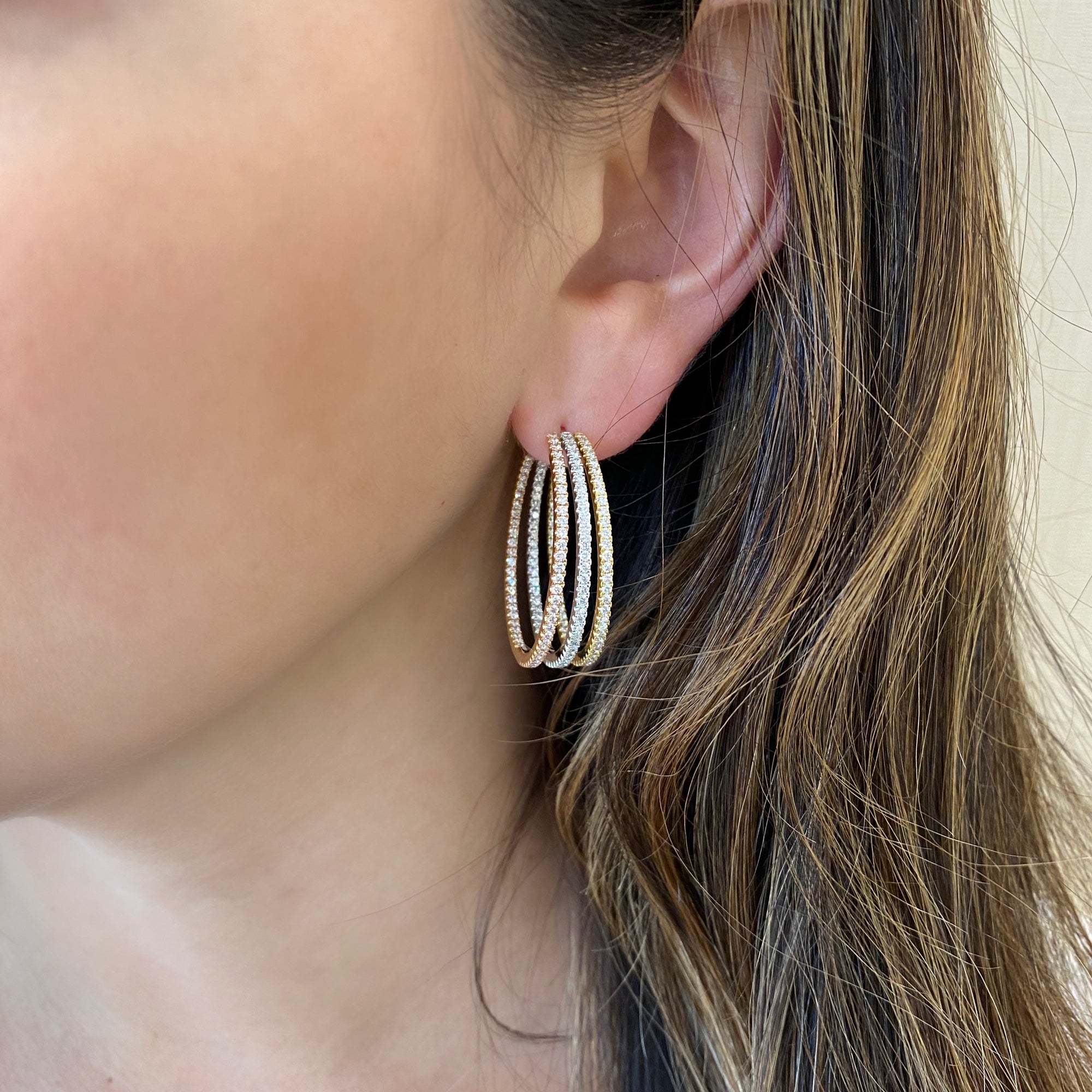 Tri-color inside-out diamond hoop earrings  -18k gold weighing 18.57 grams  -336 round diamonds weighing 2.89 carats