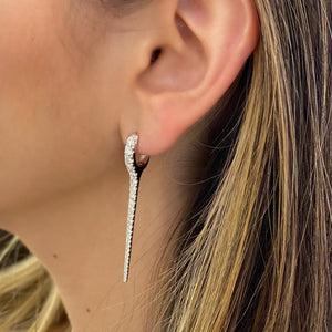 Female Model Wearing Diamond Dagger Earrings  - 14K gold weighing 7.90 grams  - 52 round diamonds totaling 1.64 carats