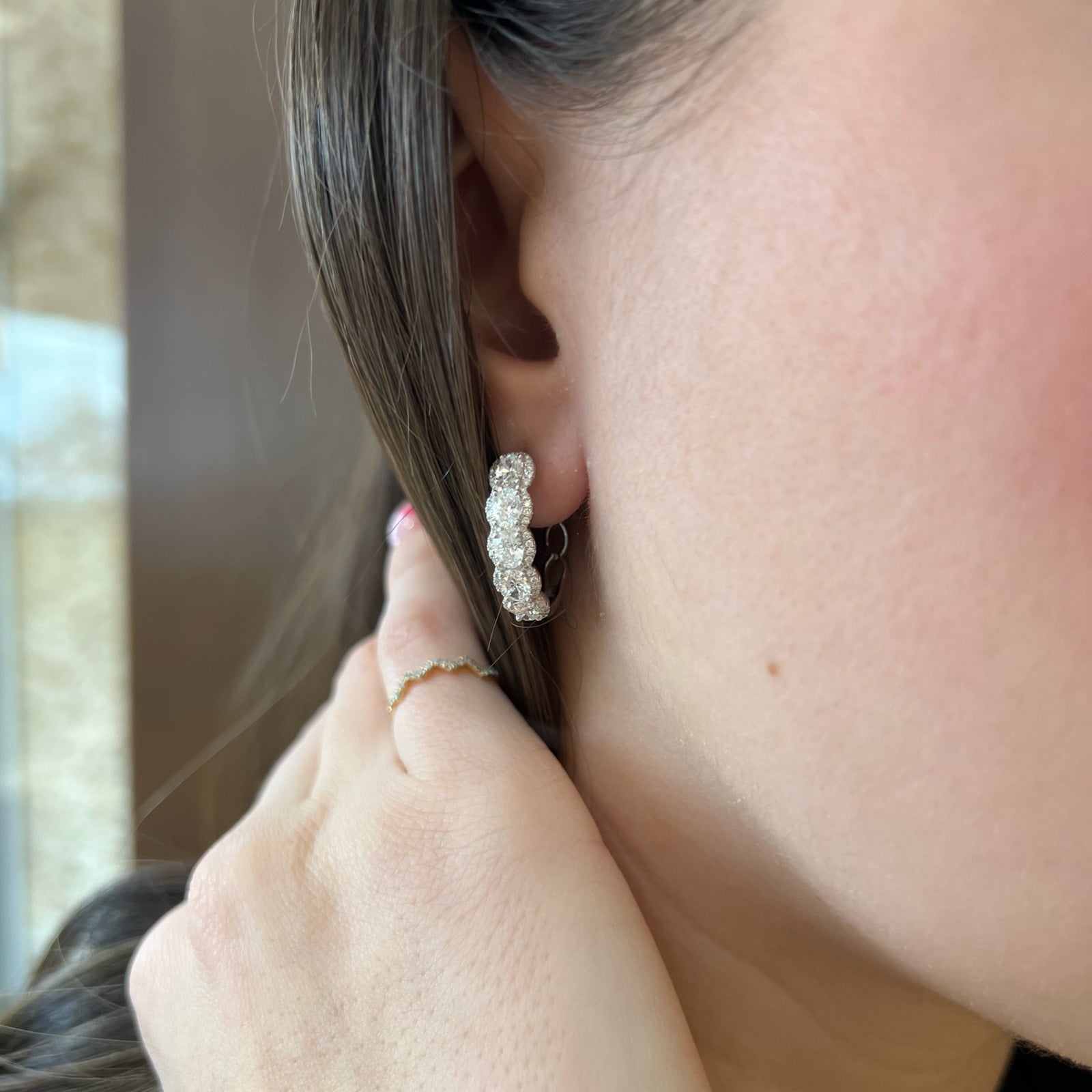 Diamond Oval Hoop Earrings - 18K gold weighing 5.68 grams  - 10 oval-shaped diamonds weighing 2.16 carats  - 112 round diamonds weighing 0.39 carats