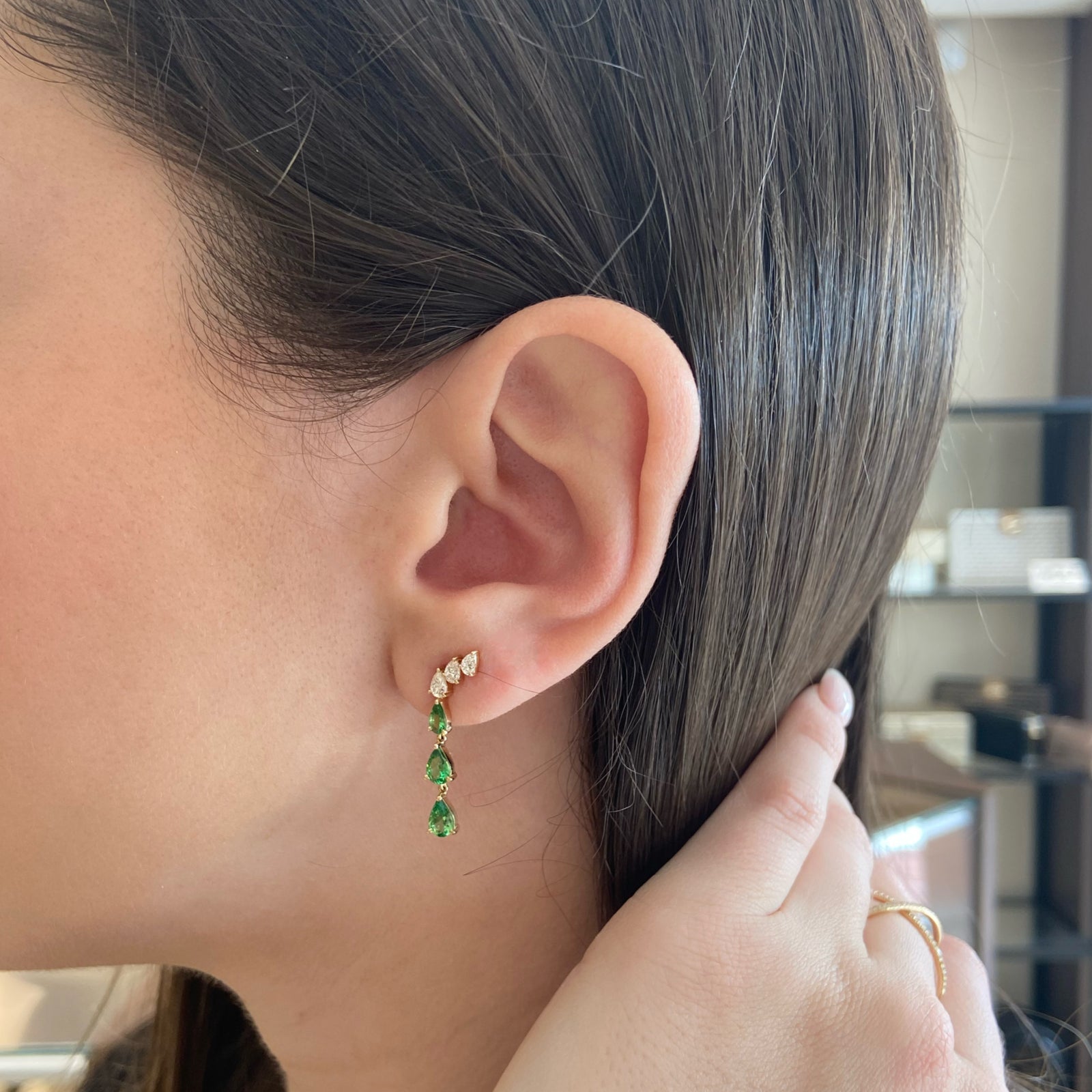 Tsavorite and Diamond Drop Earrings - 14K gold weighing 2.22 grams  - 6 pear-shaped tsavorites weighing 1.36 carats  - 6 pear-shaped diamonds weighing 0.64 carats