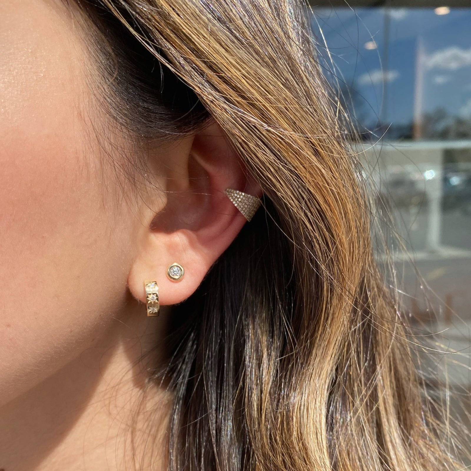 Diamond Star Huggie Earrings - 14K gold weighing 2.98 grams  - 6 round diamonds weighing 0.10 carats