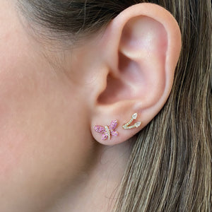 Female model wearing Pink Sapphire & Diamond Butterfly Stud Earrings - 14K rose gold weighing 1.89 grams - 12 round diamonds totaling 0.05 carats - 56 pink sapphires totaling 0.52 carats