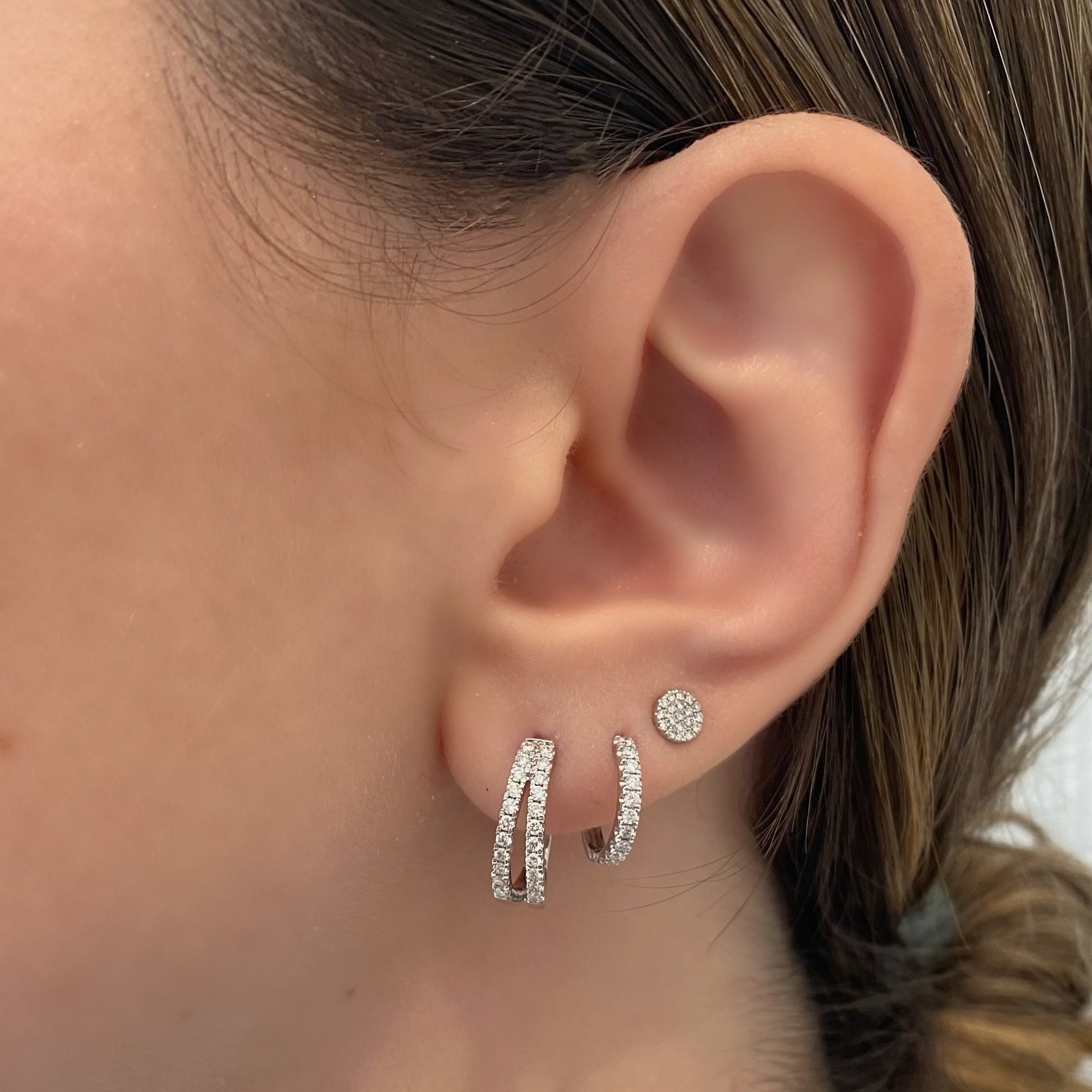 Diamond open huggie earrings - 14K gold weighing 2.98 grams  - 44 round diamonds totaling 0.42 carats