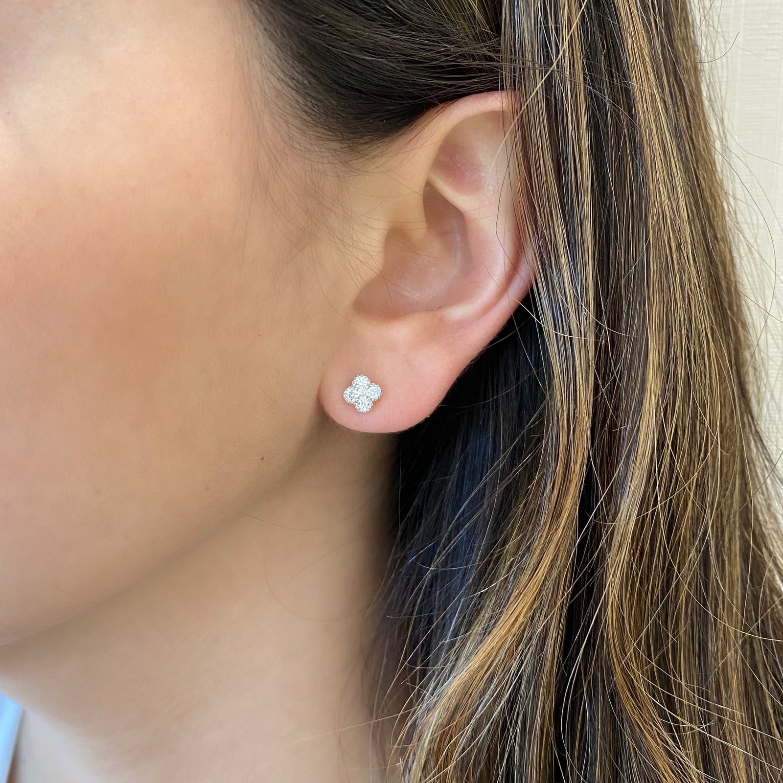 Diamond Four-Flower Stud Earrings - 18K white gold weighing 1.90 grams - 10 round diamonds totaling 0.31 carats