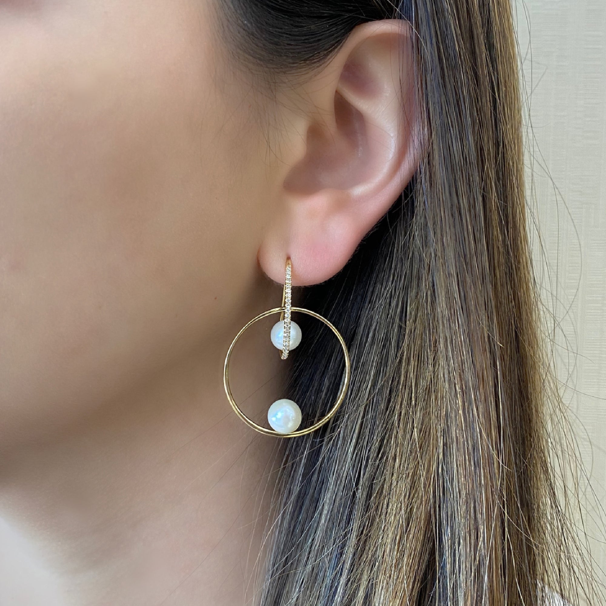 Pearl & Diamond Hoop Earrings  - 14K gold weighing 4.88 grams  - 44 round diamonds totaling 0.16 carats  - 4 pearls