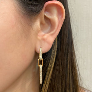 Female  Model Wearing Diamond Bold Paperclip Link Earrings  - 14K gold weighing 6.07 grams  - 238 round diamonds totaling 0.65 carats