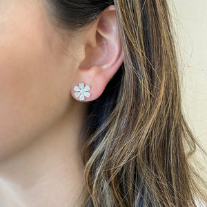 Female model wearing Large Diamond Flower Stud Earrings - 14K gold weighing 2.53 grams - 62 round diamonds totaling 0.74 carats