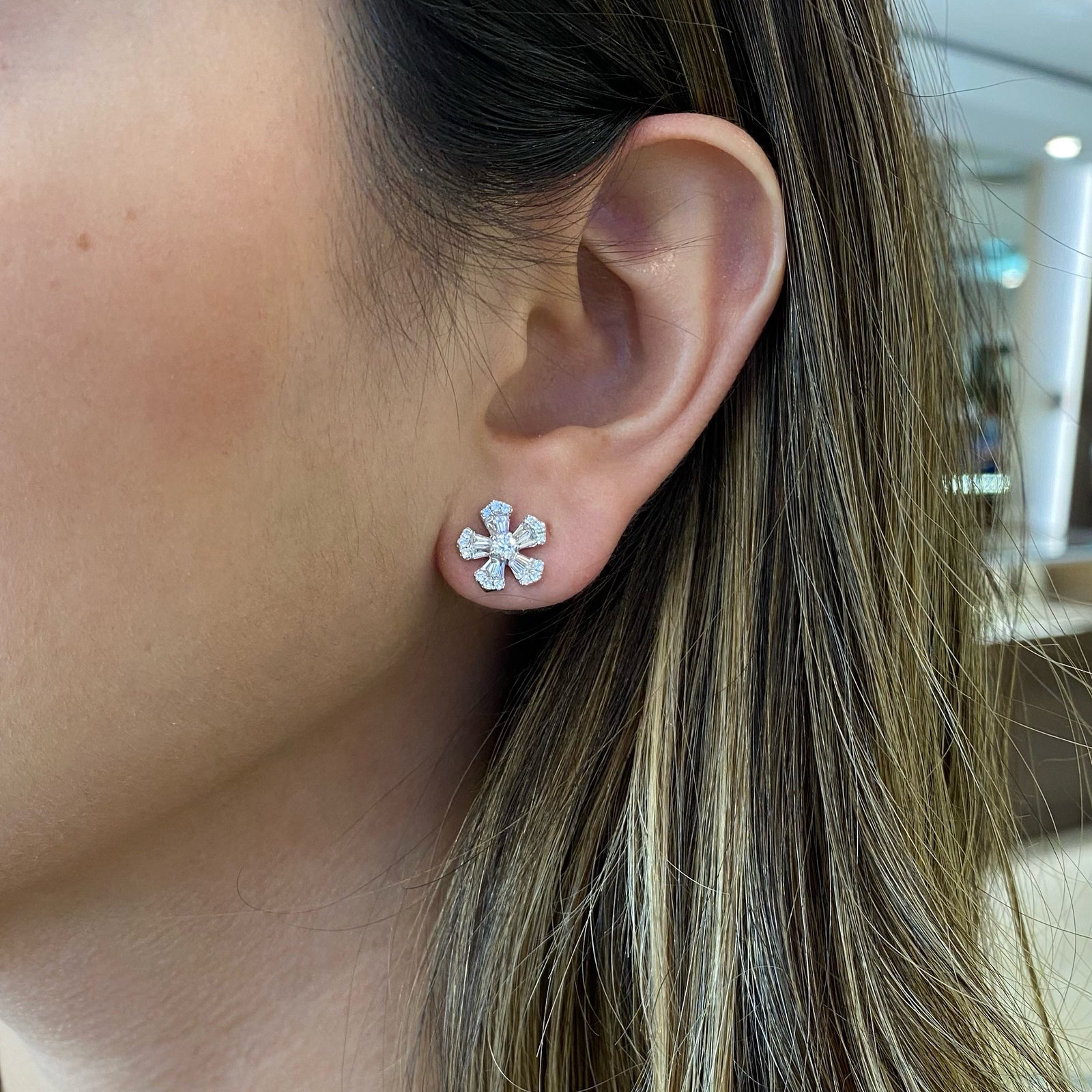 Round & Baguette Diamond Large Flower Stud Earrings - 14K white gold weighing 3.22 grams  - 20 slim baguettes totaling 0.54 carats  - 32 round diamonds totaling 0.38 carats