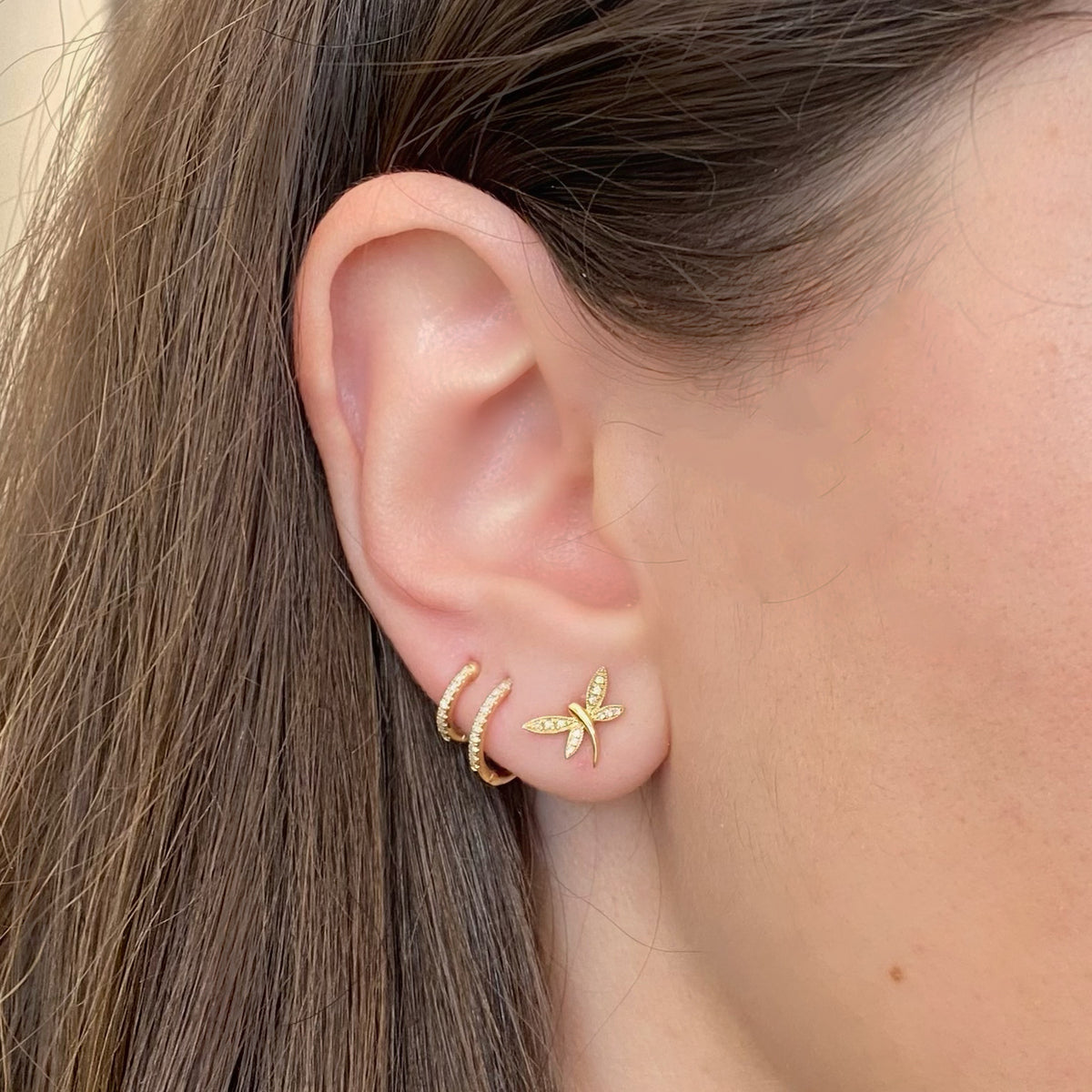 Female Model Wearing Diamond Double Huggie Earrings - 14K gold  - 0.12 cts round diamonds