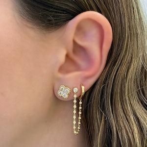 female model wearing diamond clover stud earrings - 14K gold weighing 3.00 grams  - 18 round diamonds totaling 1.06 carats