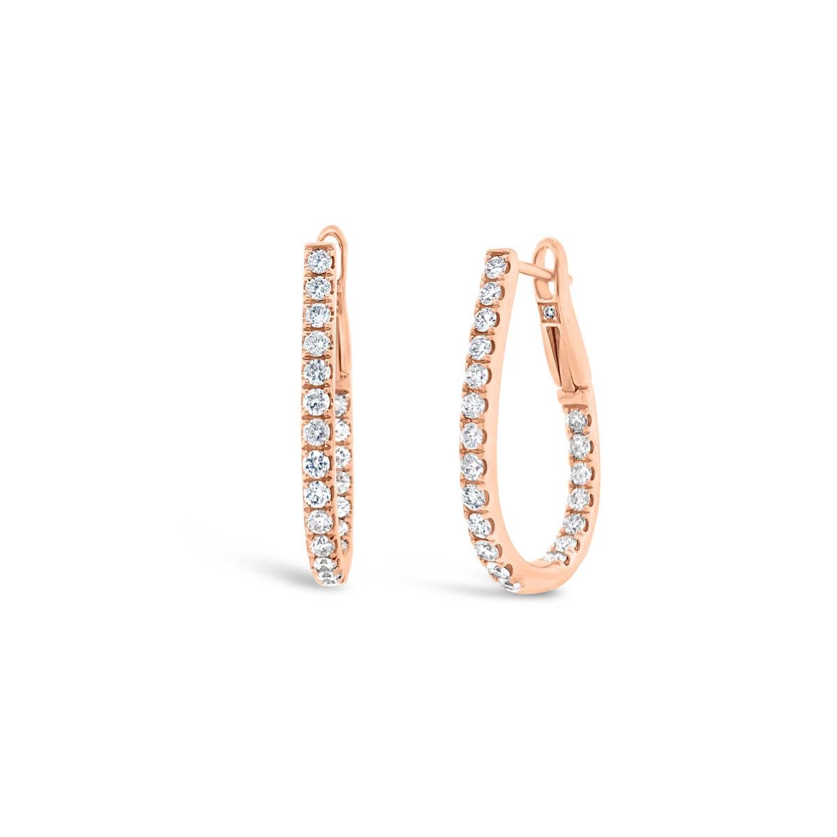 Inside-out diamond oval huggie earrings -18k gold weighing 3.91 grams -44 round diamonds weighing .67 carats