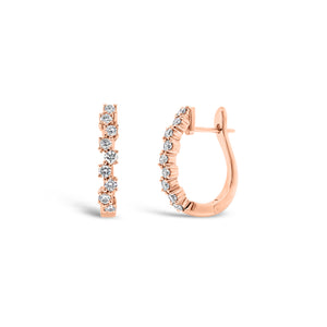 Diamond zig-zag huggie earrings - 18K gold weighing 3.79 grams  - 18 round diamonds totaling 0.56 carats