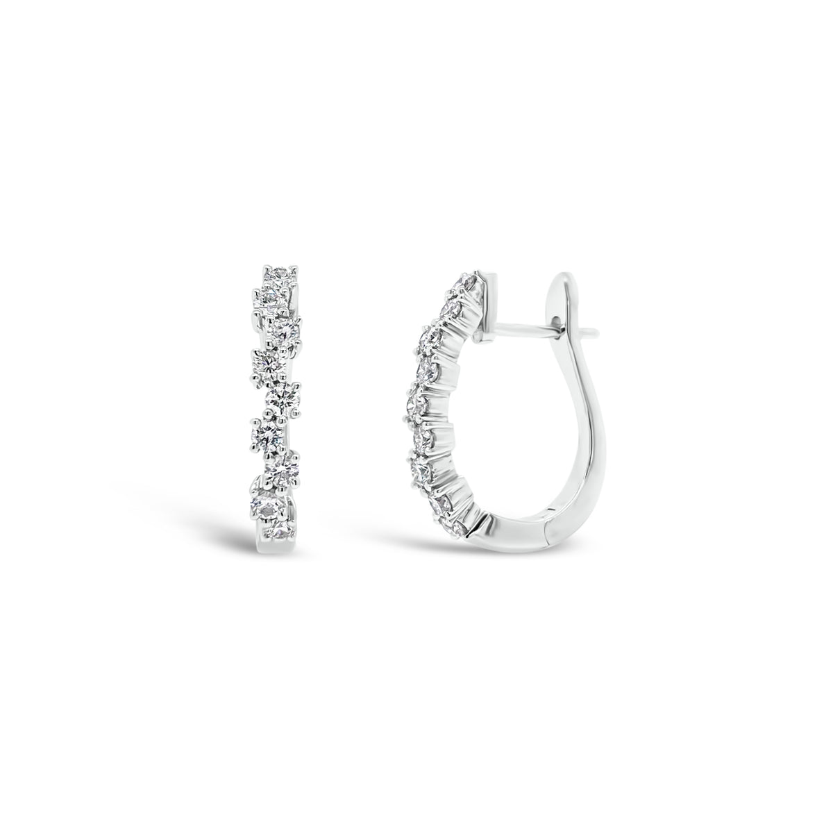 Diamond zig-zag huggie earrings - 18K gold weighing 3.79 grams  - 18 round diamonds totaling 0.56 carats