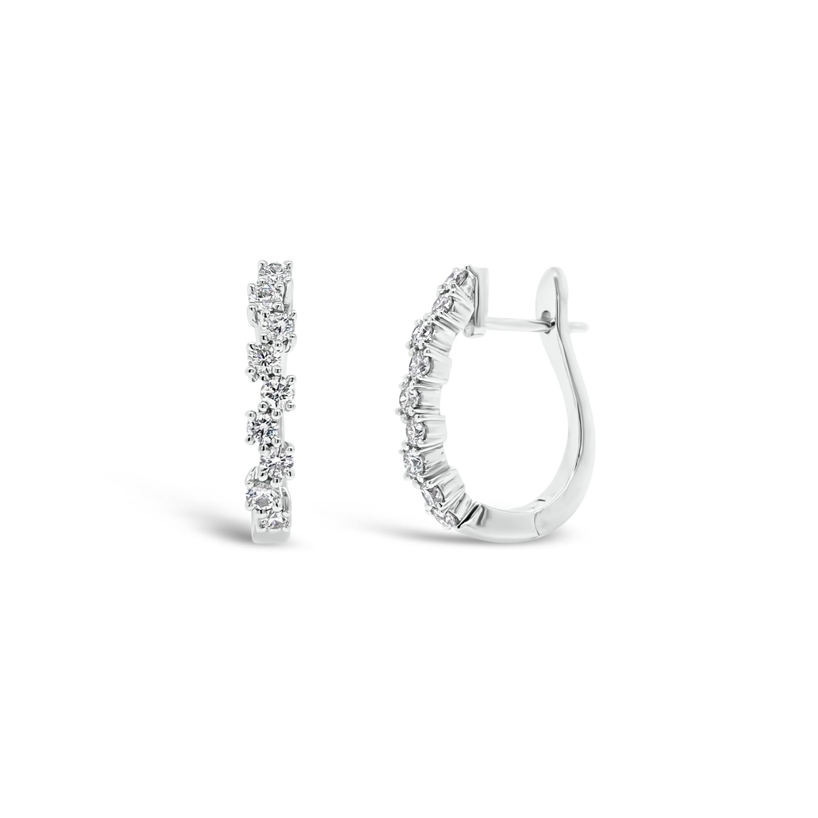 Diamond zig-zag huggie earrings - 18K gold weighing 3.79 grams  - 18 round diamonds totaling 0.56 carats