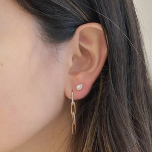 Female Model Wearing Diamond Paperclip Chain Earrings - 14K gold weighing 2.63 grams  - 52 round diamonds totaling 0.14 carats