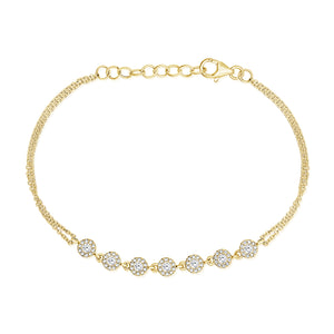 Diamond Halo Cable Chain Bracelet - 14K yellow gold weighing 3.05 grams - 7 round diamonds totaling 0.28 carats - 70 round diamonds totaling 0.23 carats