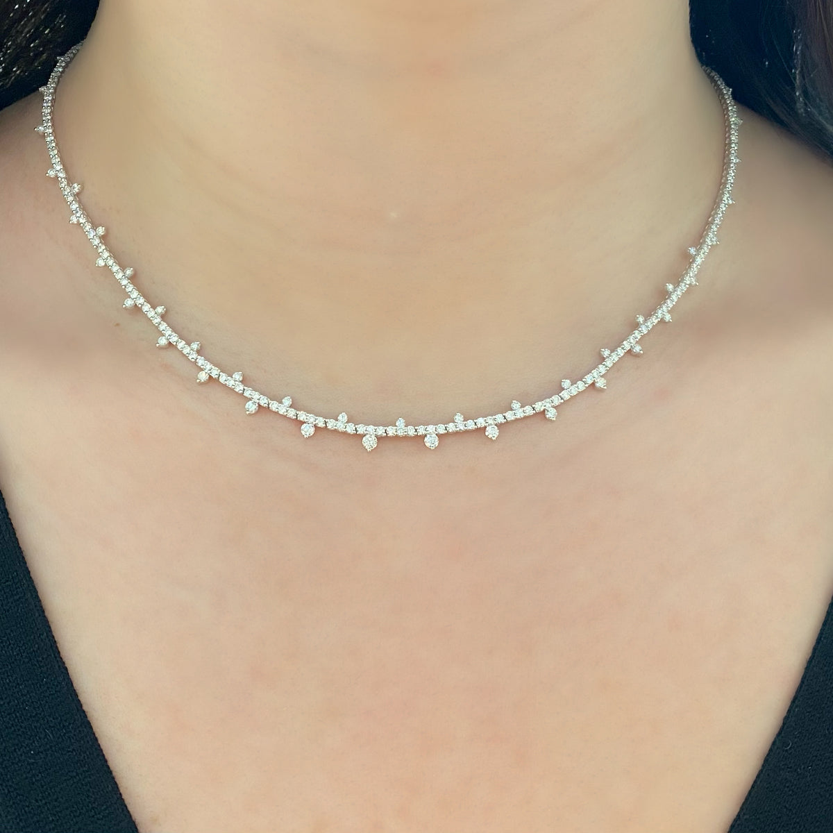 Female Model Wearing Diamond Slim Collar  - 18K gold weighing 16.88 grams  - 289 round diamonds totaling 5.43 carats