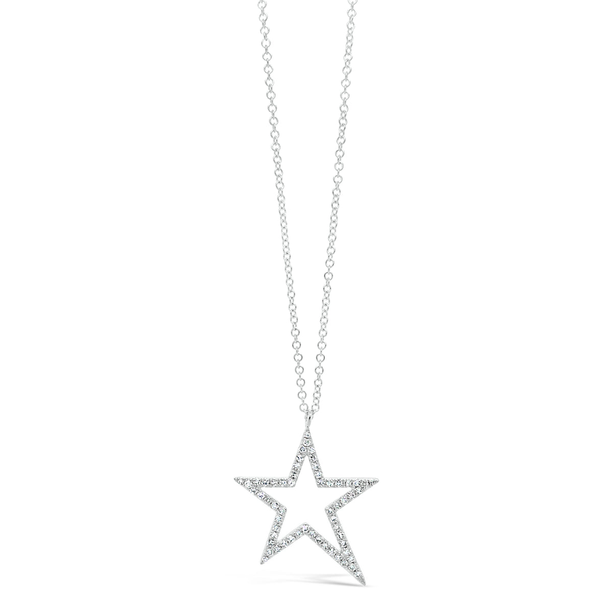 Diamond Asymmetrical Star Pendant Necklace - 14K white gold weighing 2.23 grams. - 59 round diamonds 0.17 carats.