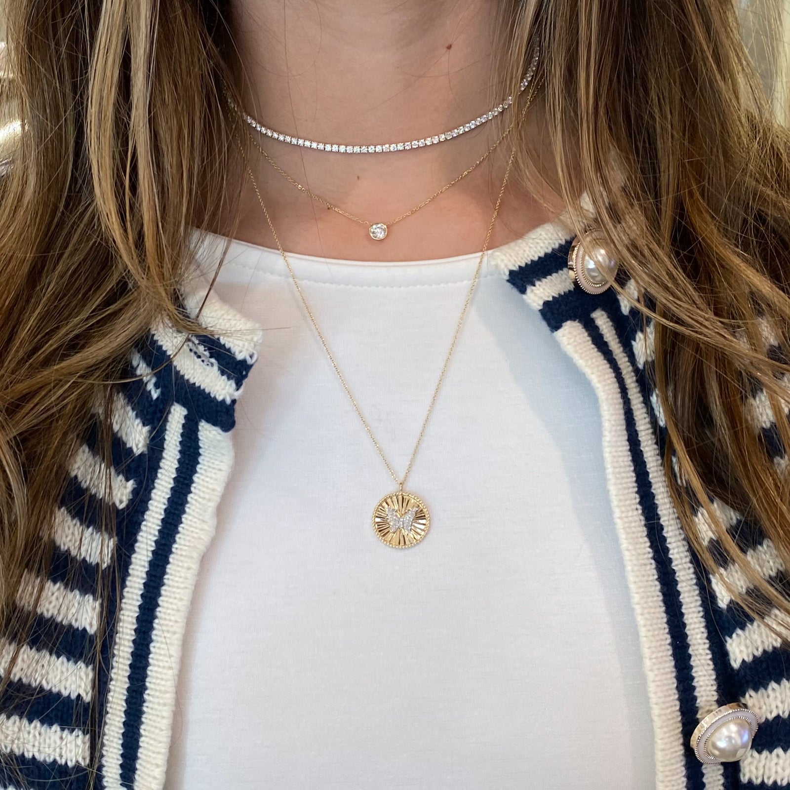 Diamond Butterfly Disc Pendant - 14K yellow gold weighing 4.22 grams  - 53 round diamonds weighing 0.10 carats