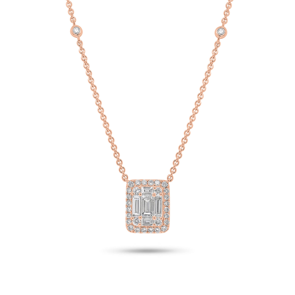 Solid 18k rose gold weighing 4.22 grams with 32 round diamonds weighing 0.29 carats and 5 slim baguettes weighing 0.45 carats Emerald-Cut Diamond Illusion Pendant Necklace | Nuha Jewelers