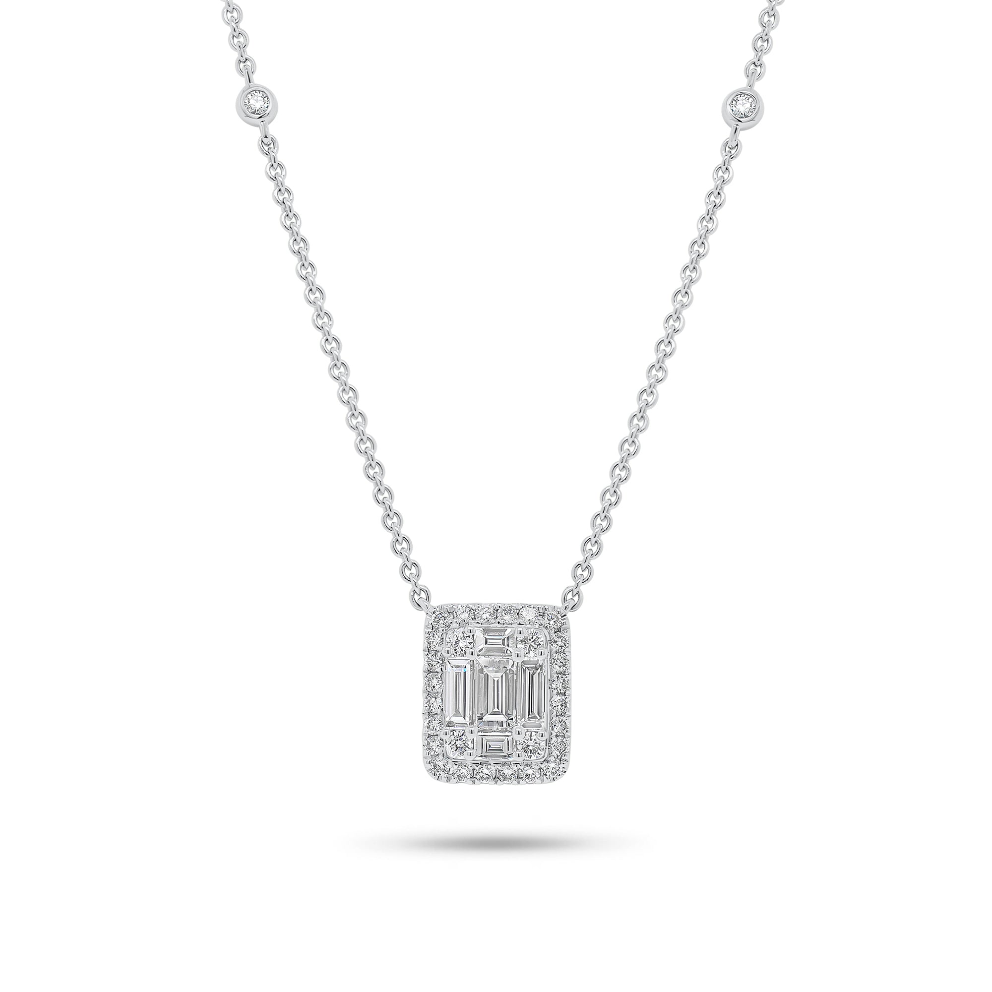Solid 18k white gold weighing 4.22 grams with 32 round diamonds weighing 0.29 carats and 5 slim baguettes weighing 0.45 carats Emerald-Cut Diamond Illusion Pendant Necklace | Nuha Jewelers