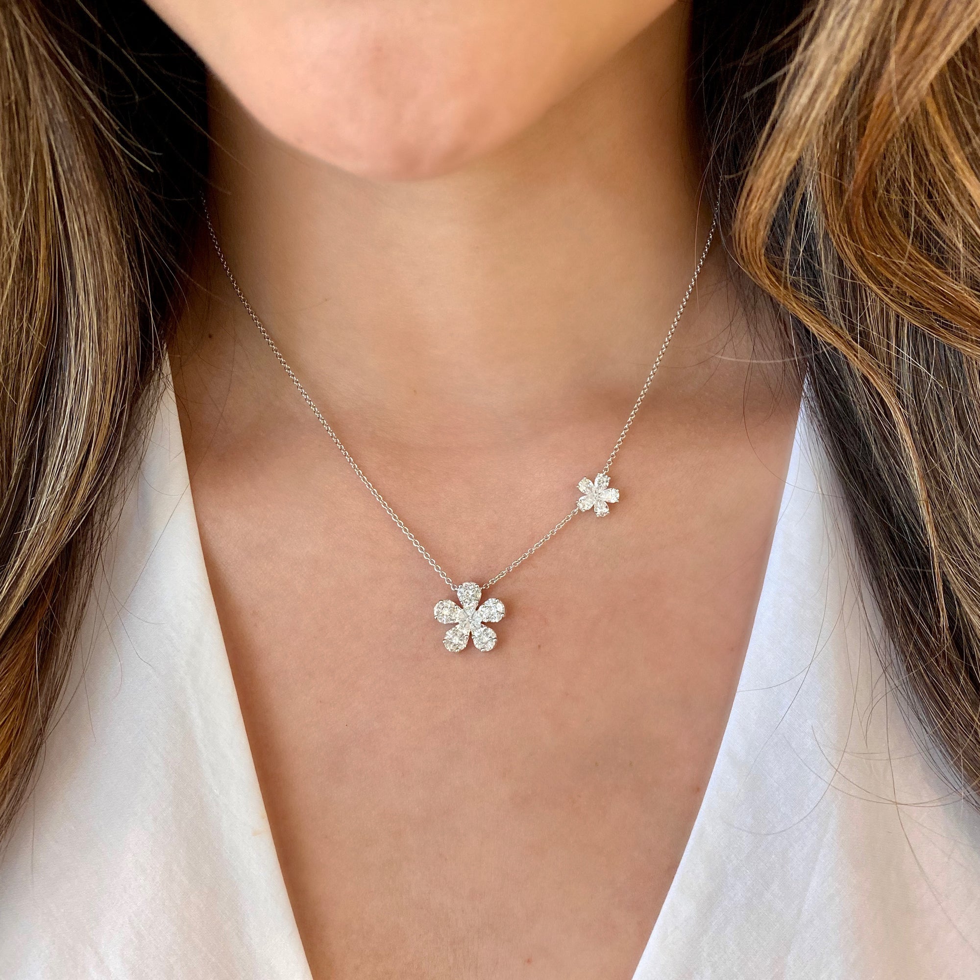 Mixed Cut Diamond Flower Necklace  - 18K gold weighing 5.56 grams  - 10 pear-shaped diamonds totaling 1.13 carats  - 15 marquise-shaped diamonds totaling 0.45 carats  - 5 princess-cut diamonds totaling 0.13 carats