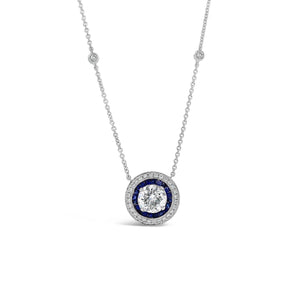 Diamond Solitaire Necklace with Sapphires and Bezel-Set Diamond Stations  - 18K gold weighing 5.50 grams  - 1.39 ct round brilliant-cut diamond (GIA-graded G-H color, I2 clarity)  - 20 sapphires totaling 0.59 carats  - 32 round diamonds totaling 0.30 carats