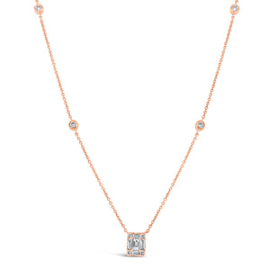 Diamond Rectangle Pendant with Bezel-Set Diamond Stations  - 14K gold weighing 2.02 grams  - 8 round diamonds totaling 0.14 carats  - 5 straight baguettes totaling 0.21 carats