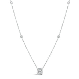 Diamond Rectangle Pendant with Bezel-Set Diamond Stations  - 14K gold weighing 2.02 grams  - 8 round diamonds totaling 0.14 carats  - 5 straight baguettes totaling 0.21 carats