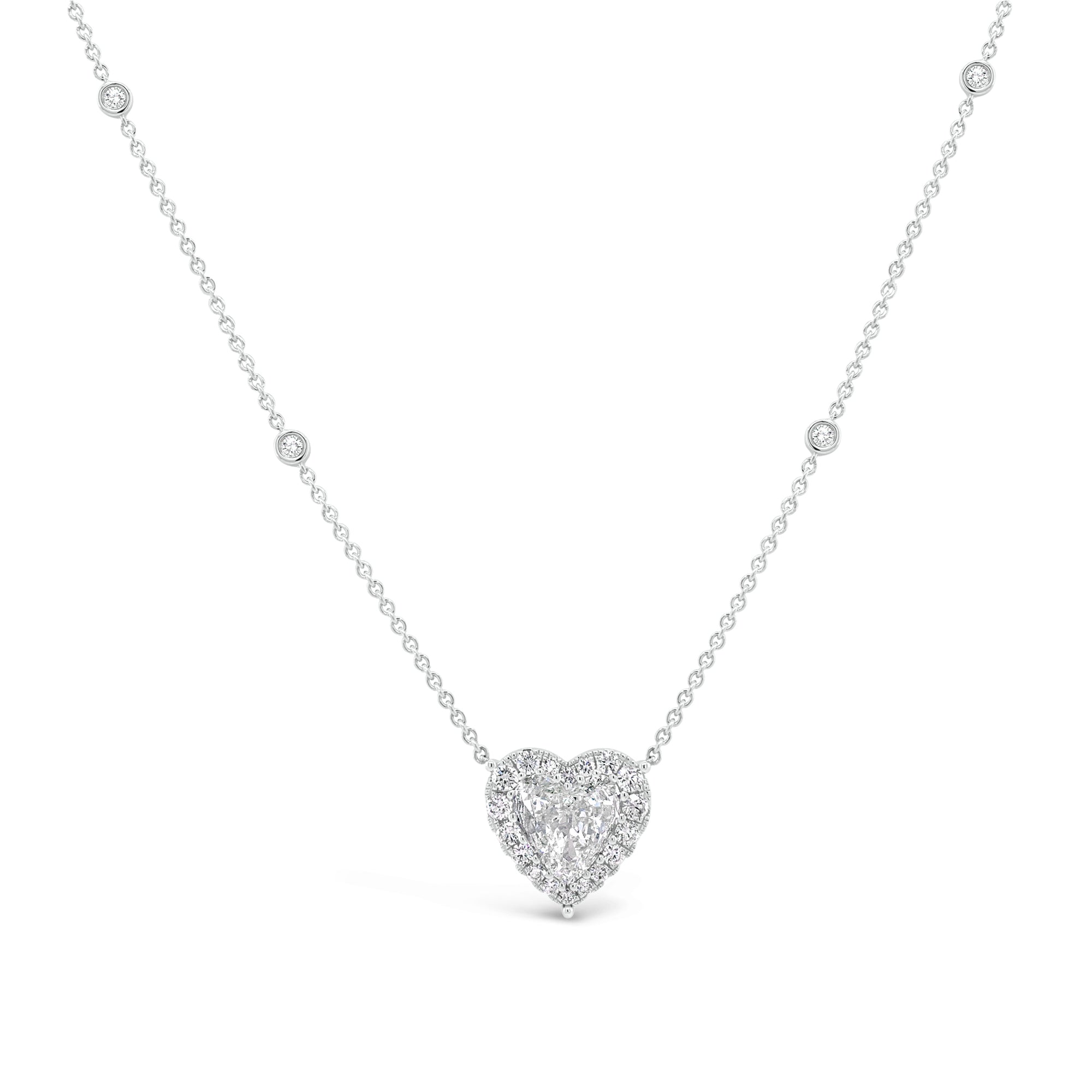 Diamond Heart Pendant Necklace with Halo  -18K gold weighing 5.99 grams  -1.67 ct heart-shaped diamond (GIA-graded J color, SI2 clarity)  -22 round diamonds totaling 0.58 carats