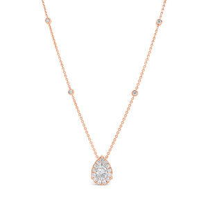 Diamond Pear Shape Necklace with Halo  -18K gold weighing 4.79 grams  -0.84 ct pear-shaped diamond (Fracture Filled diamond)  -17 round diamonds totaling 0.46 carats