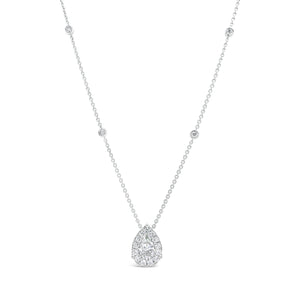Diamond Pear Shape Necklace with Halo  -18K gold weighing 4.79 grams  -0.84 ct pear-shaped diamond (Fracture Filled diamond)  -17 round diamonds totaling 0.46 carats