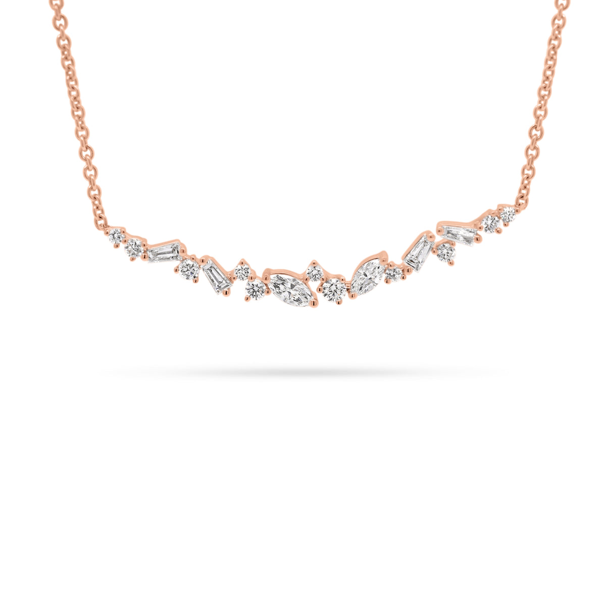 Mixed Cut Diamond Bar Necklace  - 18K gold weighing 3.48 grams  - 2 marquise-shaped diamonds totaling 0.18 carats  - 11 round diamonds totaling 0.19 carats  - 4 tapered baguettes totaling 0.17 carats