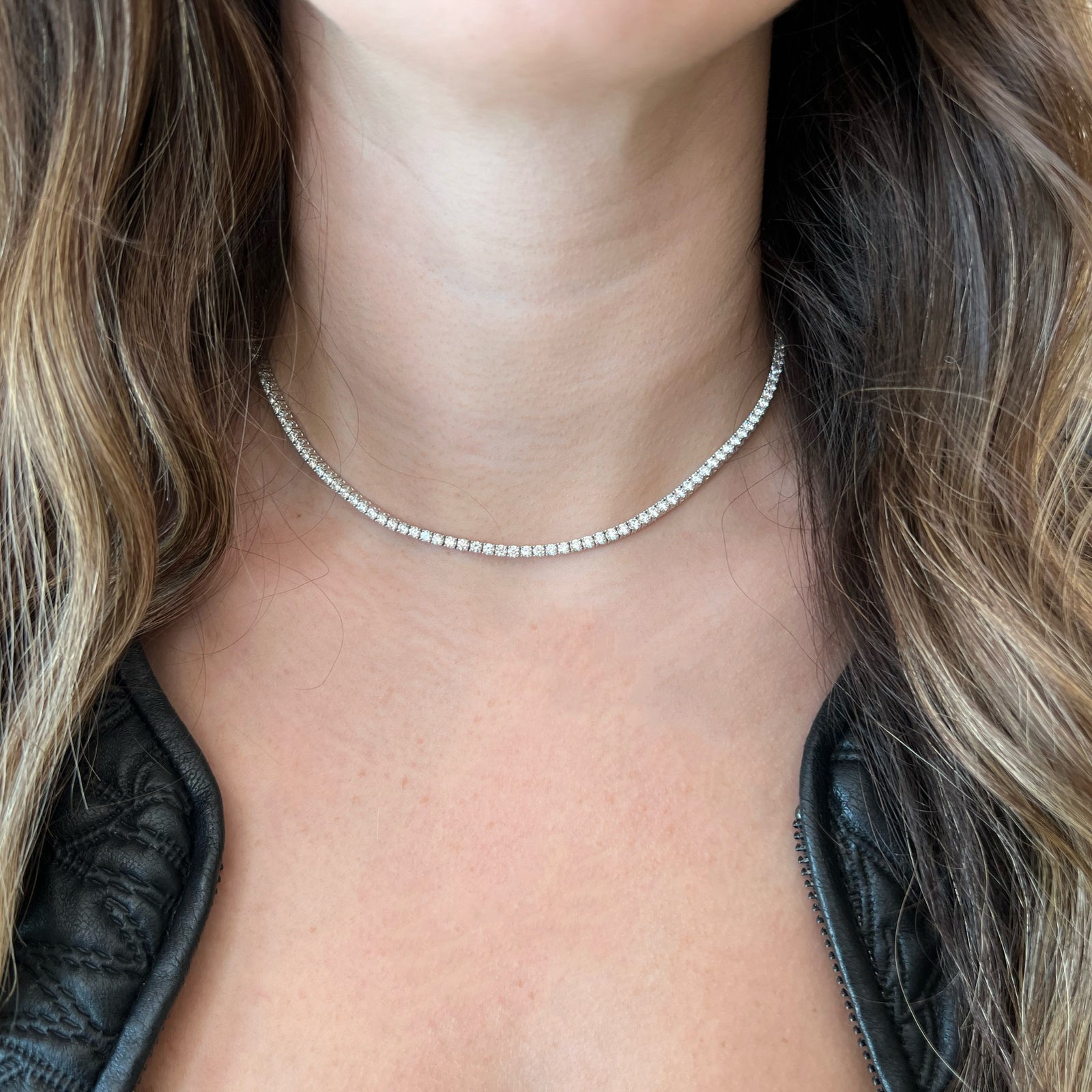 10.61 ct Diamond Tennis Necklace - 14K gold weighing 19.91 grams  - 166 round diamonds weighing 10.61 carats  - 16-18” length