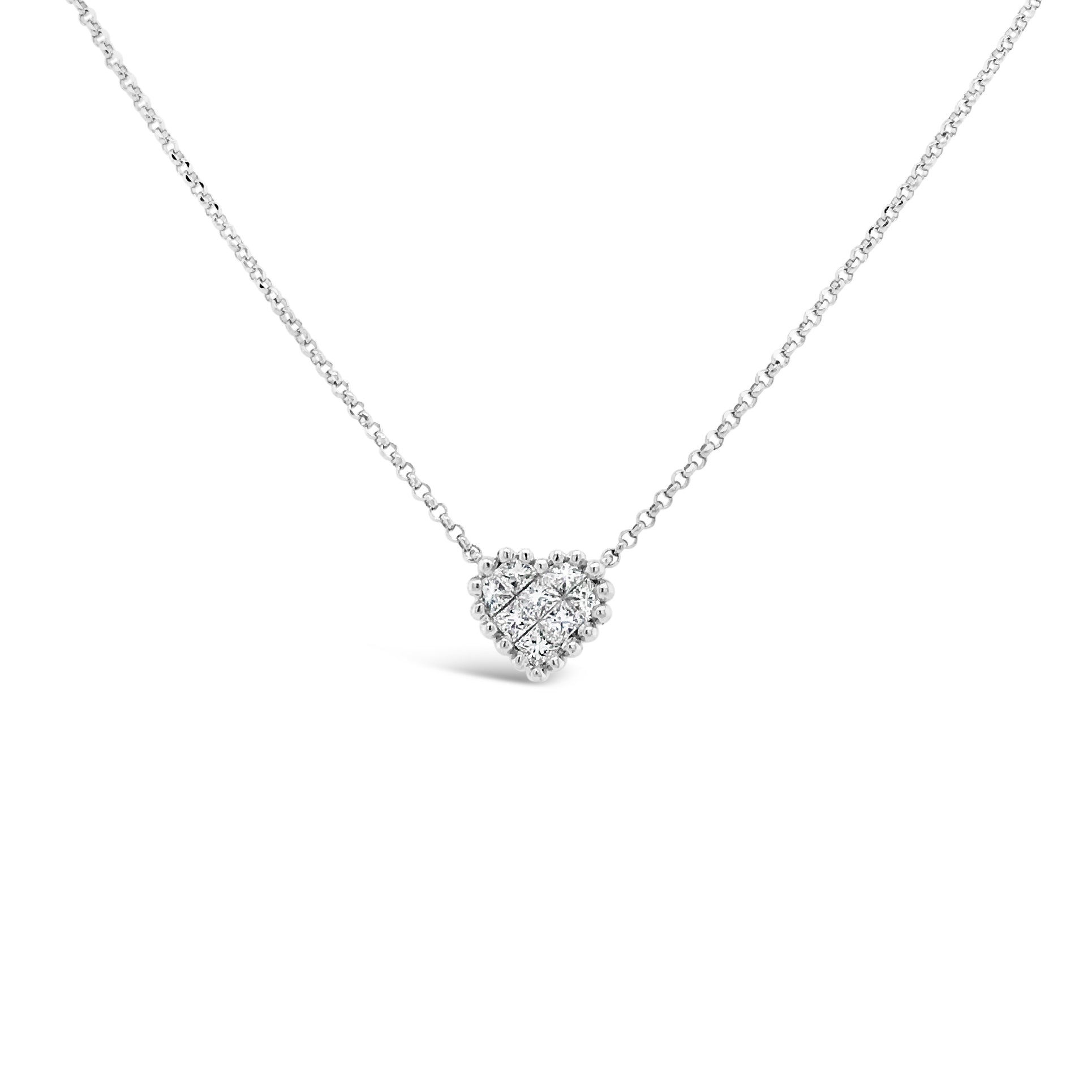 Diamond Tiny Heart Necklace  -18K gold weighing 2.58 grams  -8 princess-cut diamonds totaling 0.24 carats