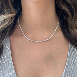 Female Model Wearing 7.61 ct Diamond Tennis Necklace - 14K gold weighing 16.81 grams  - 169 round diamonds weighing 7.61 carats