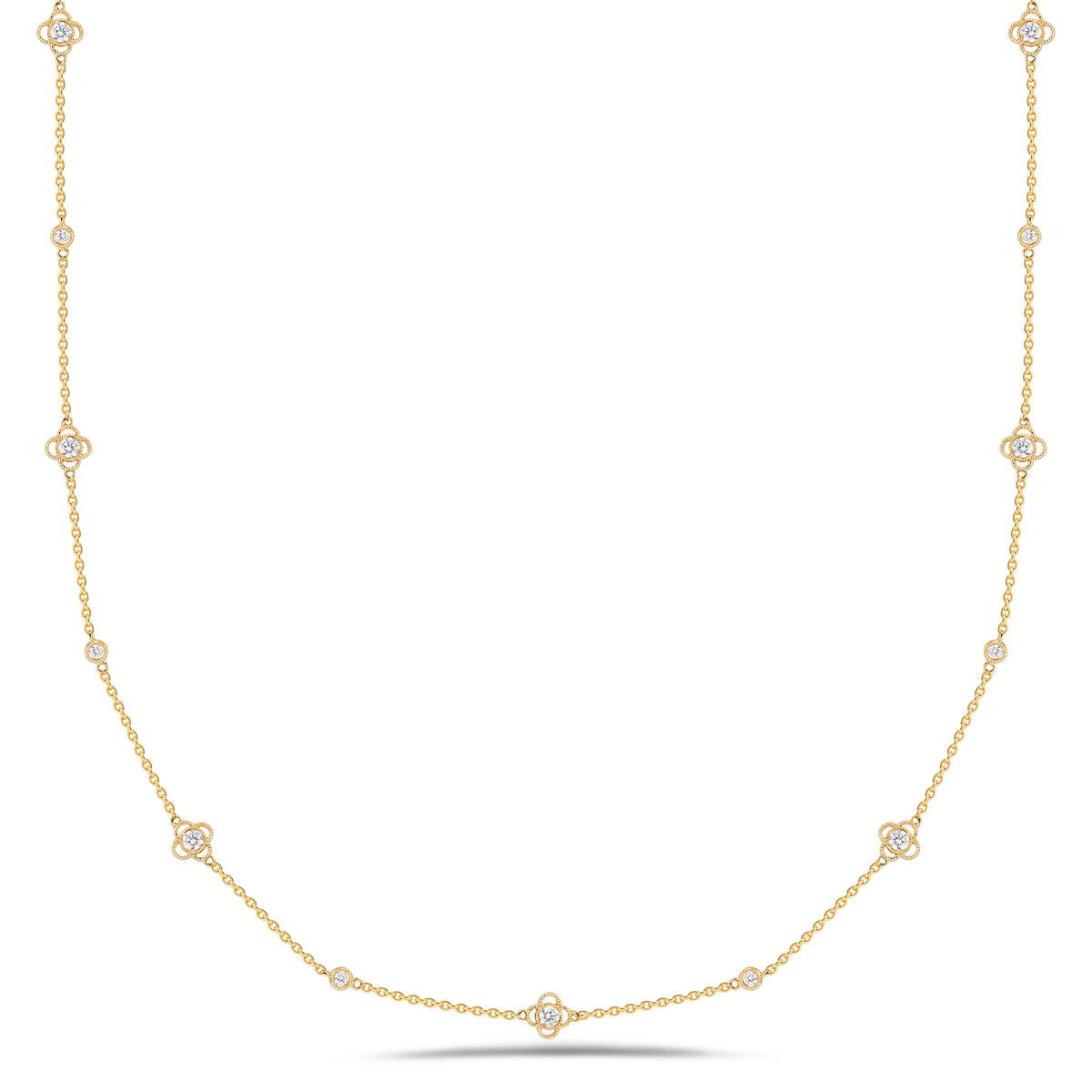 Diamonds by the Yard with Trefoils  - 14K gold weighing 5.83 grams  - 15 round diamonds totaling 0.90 carats