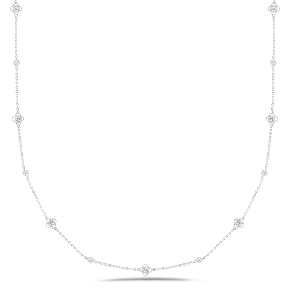 Diamonds by the Yard with Trefoils  - 14K gold weighing 5.83 grams  - 15 round diamonds totaling 0.90 carats