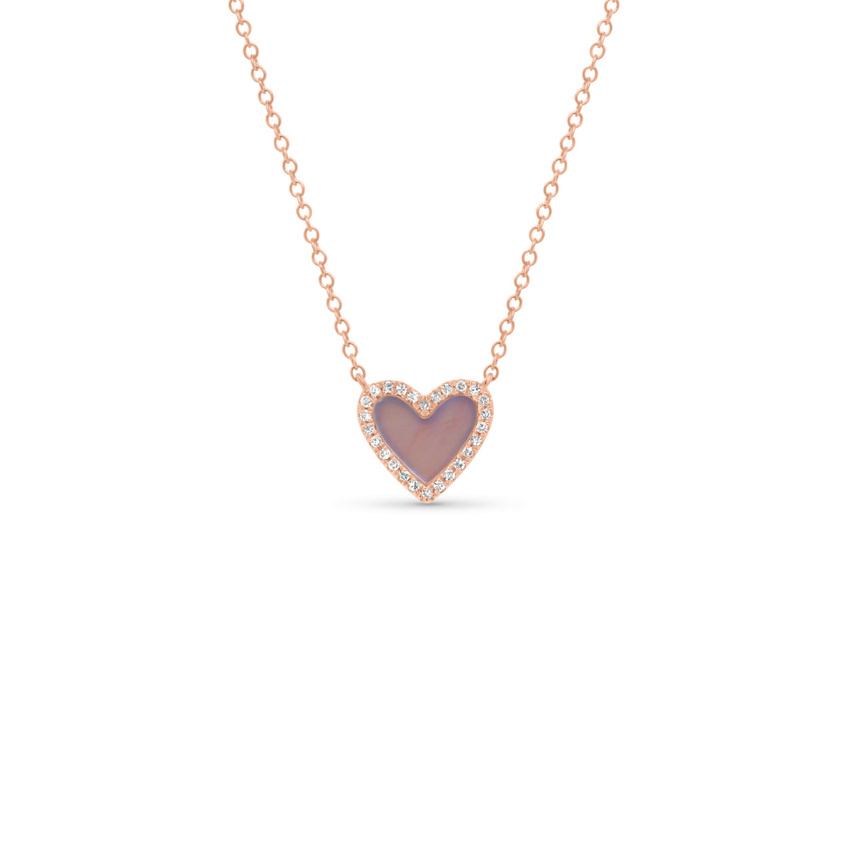 Mother of Pearl & Diamond Small Heart Pendant  - 14K gold weighing 1.57 grams  - 26 round diamonds totaling 0.07 carats  - Mother of pearl